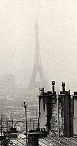 Black and white photo of the 19th-centruy landmark Eiffel Tower in the Champs de Mars in Paris, France