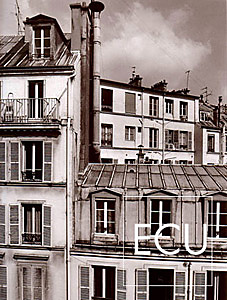 Black and white photo of the rooftops of Paris photographed from the Hotel Chaplain in Montparnasse section of the 6th arrondisement of Paris, France