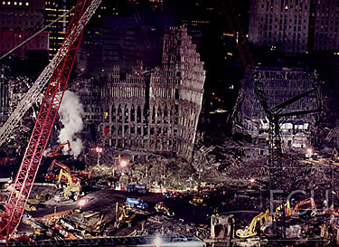 Color photo of the ruins of the original World Trade Center taken three months after 9/11 from Battery Park City