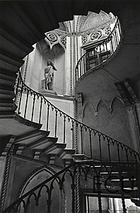 Black and white photo of the interior of the Palazzo Giovanelli featuring a remarkably engineered and designed stair in Venice, Italy