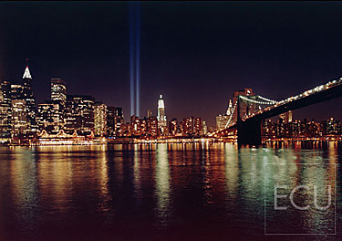 Color photograph taken at night of the Tribute in Light memorializing the original destroyed World Trade Center in Manhattan, New York