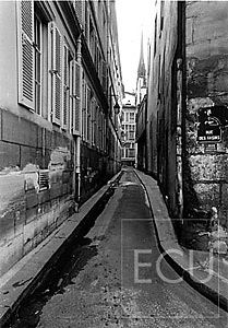 Black and white photo of the rue des Chantres located next to Notre Dame on the Ile de la Cité in Paris, France